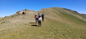 Dyadyuchenko Peak behind the expedition group, July 2025