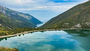 Kapka-Tash Lake in the foreground, with lower Kara-Suu Lake visible beyond, July 2025