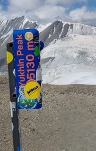 Summit post box and view from Yukhin Peak