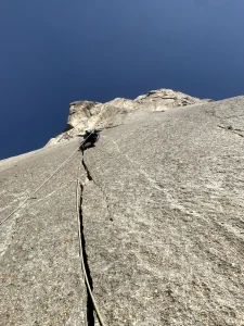 Chris climbing the long crack on Perestroika Crack, Russian Tower.