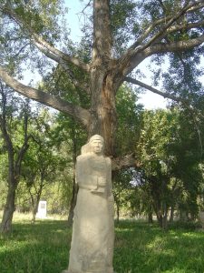 The First Teacher in the sculpture garden at Sheker